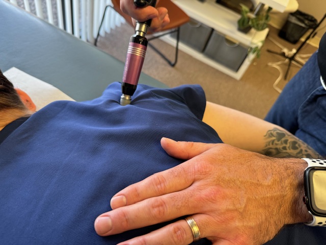 Shoulder adjustemnt Chiropractic adjustment for headache