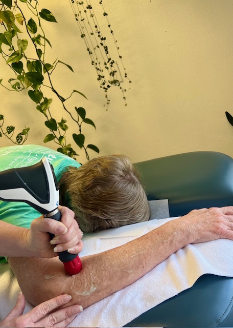 Shockwave Tennis Elbow Chiropractic adjustment for headache